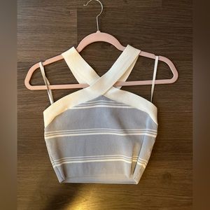 Aritzia blue/white crop top with crisscross neck. Babaton. Size M